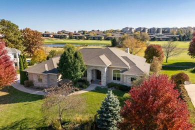 Situated along Hawk's Landing's premier fairway, this custom on Hawks Landing Golf Club in Wisconsin - for sale on GolfHomes.com, golf home, golf lot