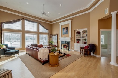 Situated along Hawk's Landing's premier fairway, this custom on Hawks Landing Golf Club in Wisconsin - for sale on GolfHomes.com, golf home, golf lot