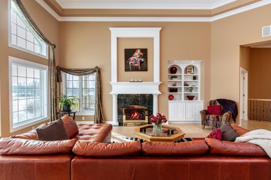 Situated along Hawk's Landing's premier fairway, this custom on Hawks Landing Golf Club in Wisconsin - for sale on GolfHomes.com, golf home, golf lot