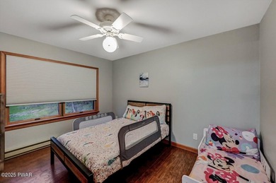 Experience the perfect blend of modern luxury and serene on The Hideout Golf in Pennsylvania - for sale on GolfHomes.com, golf home, golf lot