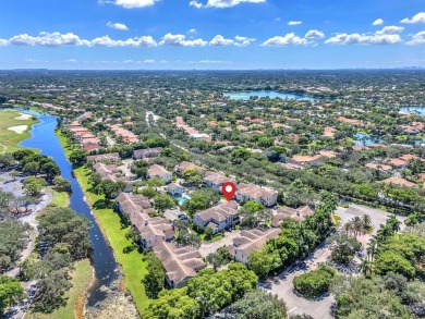 WAKE UP TO SERENE GARDEN VIEWS & INDULGE IN RESORT STYLE on TPC Eagle Trace in Florida - for sale on GolfHomes.com, golf home, golf lot