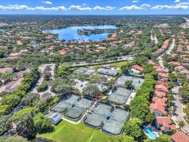 WAKE UP TO SERENE GARDEN VIEWS & INDULGE IN RESORT STYLE on TPC Eagle Trace in Florida - for sale on GolfHomes.com, golf home, golf lot