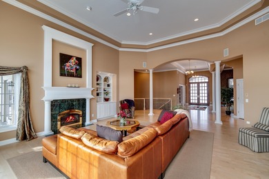 Situated along Hawk's Landing's premier fairway, this custom on Hawks Landing Golf Club in Wisconsin - for sale on GolfHomes.com, golf home, golf lot