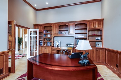 Situated along Hawk's Landing's premier fairway, this custom on Hawks Landing Golf Club in Wisconsin - for sale on GolfHomes.com, golf home, golf lot