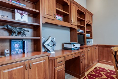 Situated along Hawk's Landing's premier fairway, this custom on Hawks Landing Golf Club in Wisconsin - for sale on GolfHomes.com, golf home, golf lot