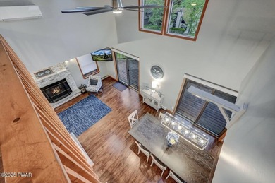 Experience the perfect blend of modern luxury and serene on The Hideout Golf in Pennsylvania - for sale on GolfHomes.com, golf home, golf lot