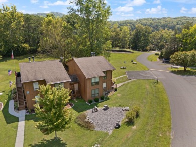 Spacious Upper level 2 bedroom 2 full bath condo located at on Woodson Bend Resort in Kentucky - for sale on GolfHomes.com, golf home, golf lot