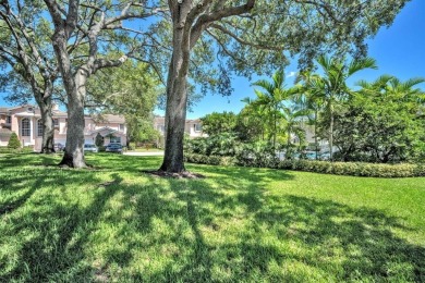 WAKE UP TO SERENE GARDEN VIEWS & INDULGE IN RESORT STYLE on TPC Eagle Trace in Florida - for sale on GolfHomes.com, golf home, golf lot