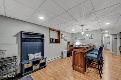 Experience the perfect blend of modern luxury and serene on The Hideout Golf in Pennsylvania - for sale on GolfHomes.com, golf home, golf lot