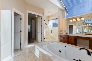 Under contract-accepting backup offers. This executive pool home on Heathrow Country Club in Florida - for sale on GolfHomes.com, golf home, golf lot