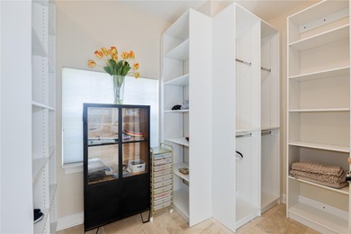 Under contract-accepting backup offers. This executive pool home on Heathrow Country Club in Florida - for sale on GolfHomes.com, golf home, golf lot