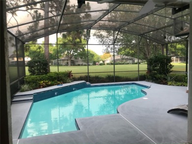 Direct golf course pool home sits on 14 hole of the beautiful on Sweetwater Country Club in Florida - for sale on GolfHomes.com, golf home, golf lot