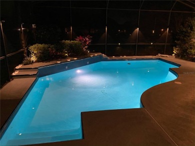 Direct golf course pool home sits on 14 hole of the beautiful on Sweetwater Country Club in Florida - for sale on GolfHomes.com, golf home, golf lot