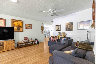 This spacious, end unit Bostonian is located in the much sought on On Top of the World Golf Course in Florida - for sale on GolfHomes.com, golf home, golf lot