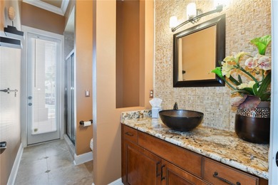 Under contract-accepting backup offers. This executive pool home on Heathrow Country Club in Florida - for sale on GolfHomes.com, golf home, golf lot