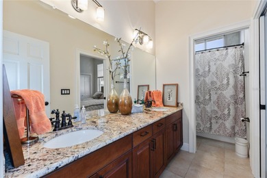 Under contract-accepting backup offers. This executive pool home on Heathrow Country Club in Florida - for sale on GolfHomes.com, golf home, golf lot