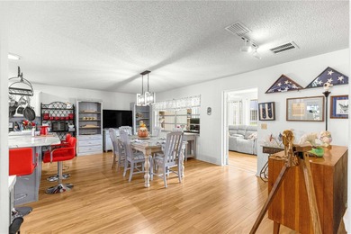 This spacious, end unit Bostonian is located in the much sought on On Top of the World Golf Course in Florida - for sale on GolfHomes.com, golf home, golf lot