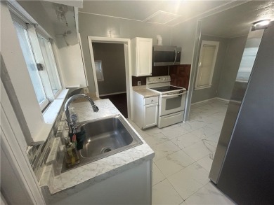 Fall in love with this charming, move-in-ready bungalow just on Genesee Valley Golf Course - North in New York - for sale on GolfHomes.com, golf home, golf lot
