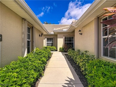 IMMACULATELY maintained, MAINTENANCE FREE attached villa in on Herons Glen Golf and Country Club in Florida - for sale on GolfHomes.com, golf home, golf lot