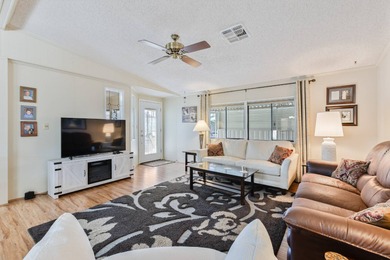 Beautifully maintained and mostly furnished, this spacious 1,456 on Painted Mountain Golf Club in Arizona - for sale on GolfHomes.com, golf home, golf lot