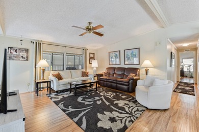 Beautifully maintained and mostly furnished, this spacious 1,456 on Painted Mountain Golf Club in Arizona - for sale on GolfHomes.com, golf home, golf lot