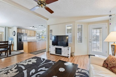 Beautifully maintained and mostly furnished, this spacious 1,456 on Painted Mountain Golf Club in Arizona - for sale on GolfHomes.com, golf home, golf lot