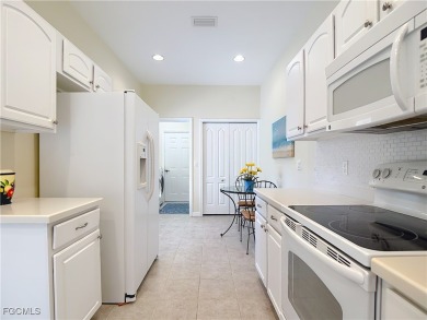 IMMACULATELY maintained, MAINTENANCE FREE attached villa in on Herons Glen Golf and Country Club in Florida - for sale on GolfHomes.com, golf home, golf lot