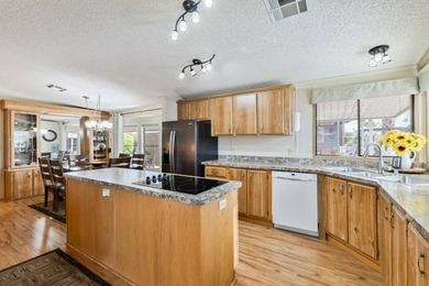 Beautifully maintained and mostly furnished, this spacious 1,456 on Painted Mountain Golf Club in Arizona - for sale on GolfHomes.com, golf home, golf lot