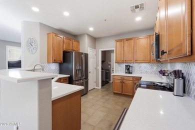 From the moment you enter this highly upgraded townhome, the on The Legacy Golf Resort in Arizona - for sale on GolfHomes.com, golf home, golf lot