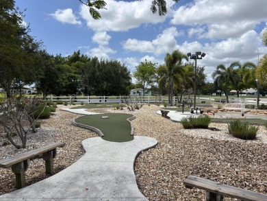 Lovely single family home, with many upgrades. Located in the on Cypress Lakes Golf Course - West Palm Beach in Florida - for sale on GolfHomes.com, golf home, golf lot
