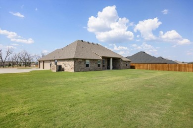 2025 like-new Coutto home with stunning interior features on Nutcracker Golf Club in Texas - for sale on GolfHomes.com, golf home, golf lot