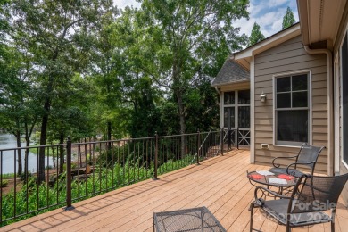 Welcome to your lakefront paradise! This beautiful lake home on Old North State Club at Uwharrie Point Golf community in North Carolina - for sale on GolfHomes.com, golf home, golf lot