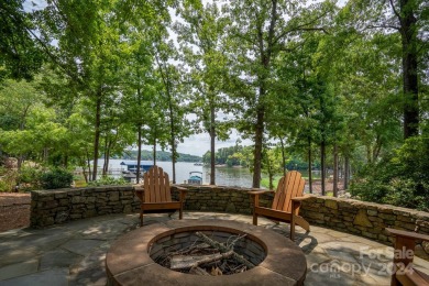 Welcome to your lakefront paradise! This beautiful lake home on Old North State Club at Uwharrie Point Golf community in North Carolina - for sale on GolfHomes.com, golf home, golf lot