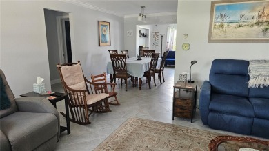 This spotless like new home can be yours! Mainlands of Tamarac on Mainlands Golf Club in Florida - for sale on GolfHomes.com, golf home, golf lot