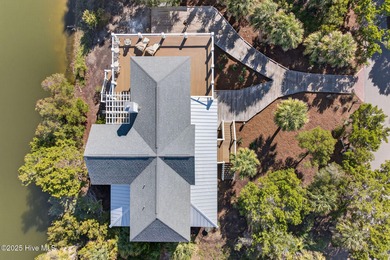 AWE-INSPIRING VIEWS! This like new home (completed in 2023) has on Bald Head Island Golf Club in North Carolina - for sale on GolfHomes.com, golf home, golf lot