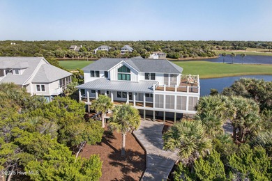 AWE-INSPIRING VIEWS! This like new home (completed in 2023) has on Bald Head Island Golf Club in North Carolina - for sale on GolfHomes.com, golf home, golf lot