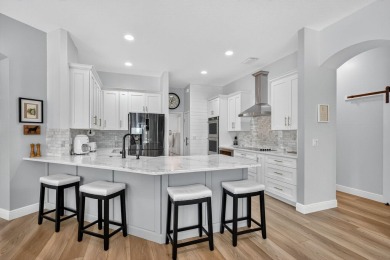 This is the ONE! Elegant and spacious, this 4 bedroom, 3 full on Hammock Creek Golf Club in Florida - for sale on GolfHomes.com, golf home, golf lot