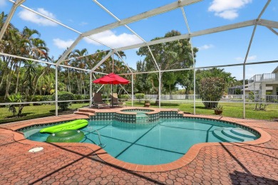 This is the ONE! Elegant and spacious, this 4 bedroom, 3 full on Hammock Creek Golf Club in Florida - for sale on GolfHomes.com, golf home, golf lot