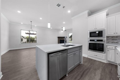 MLS# 20812507 - Built by Altura Homes - Ready Now! ~ This on Heath Golf and Yacht Club in Texas - for sale on GolfHomes.com, golf home, golf lot