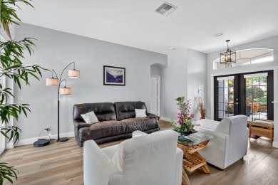 This is the ONE! Elegant and spacious, this 4 bedroom, 3 full on Hammock Creek Golf Club in Florida - for sale on GolfHomes.com, golf home, golf lot