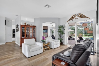 This is the ONE! Elegant and spacious, this 4 bedroom, 3 full on Hammock Creek Golf Club in Florida - for sale on GolfHomes.com, golf home, golf lot