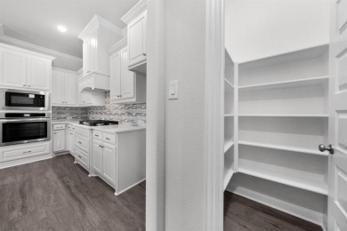 MLS# 20812507 - Built by Altura Homes - Ready Now! ~ This on Heath Golf and Yacht Club in Texas - for sale on GolfHomes.com, golf home, golf lot