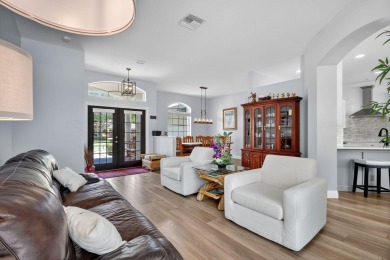 This is the ONE! Elegant and spacious, this 4 bedroom, 3 full on Hammock Creek Golf Club in Florida - for sale on GolfHomes.com, golf home, golf lot