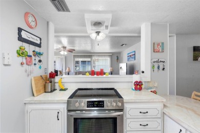 Welcome to this beautifully maintained 2-bedroom, 2-bathroom on Zellwood Station Country Club in Florida - for sale on GolfHomes.com, golf home, golf lot