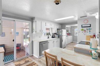 Welcome to this beautifully maintained 2-bedroom, 2-bathroom on Zellwood Station Country Club in Florida - for sale on GolfHomes.com, golf home, golf lot