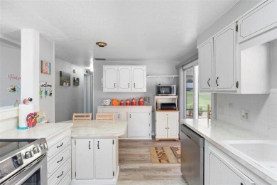 Welcome to this beautifully maintained 2-bedroom, 2-bathroom on Zellwood Station Country Club in Florida - for sale on GolfHomes.com, golf home, golf lot