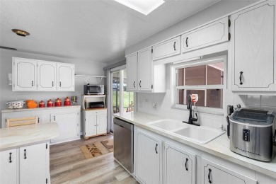 Welcome to this beautifully maintained 2-bedroom, 2-bathroom on Zellwood Station Country Club in Florida - for sale on GolfHomes.com, golf home, golf lot