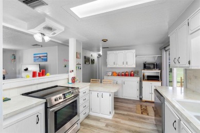 Welcome to this beautifully maintained 2-bedroom, 2-bathroom on Zellwood Station Country Club in Florida - for sale on GolfHomes.com, golf home, golf lot