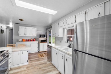 Welcome to this beautifully maintained 2-bedroom, 2-bathroom on Zellwood Station Country Club in Florida - for sale on GolfHomes.com, golf home, golf lot
