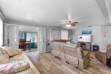 Welcome to this beautifully maintained 2-bedroom, 2-bathroom on Zellwood Station Country Club in Florida - for sale on GolfHomes.com, golf home, golf lot